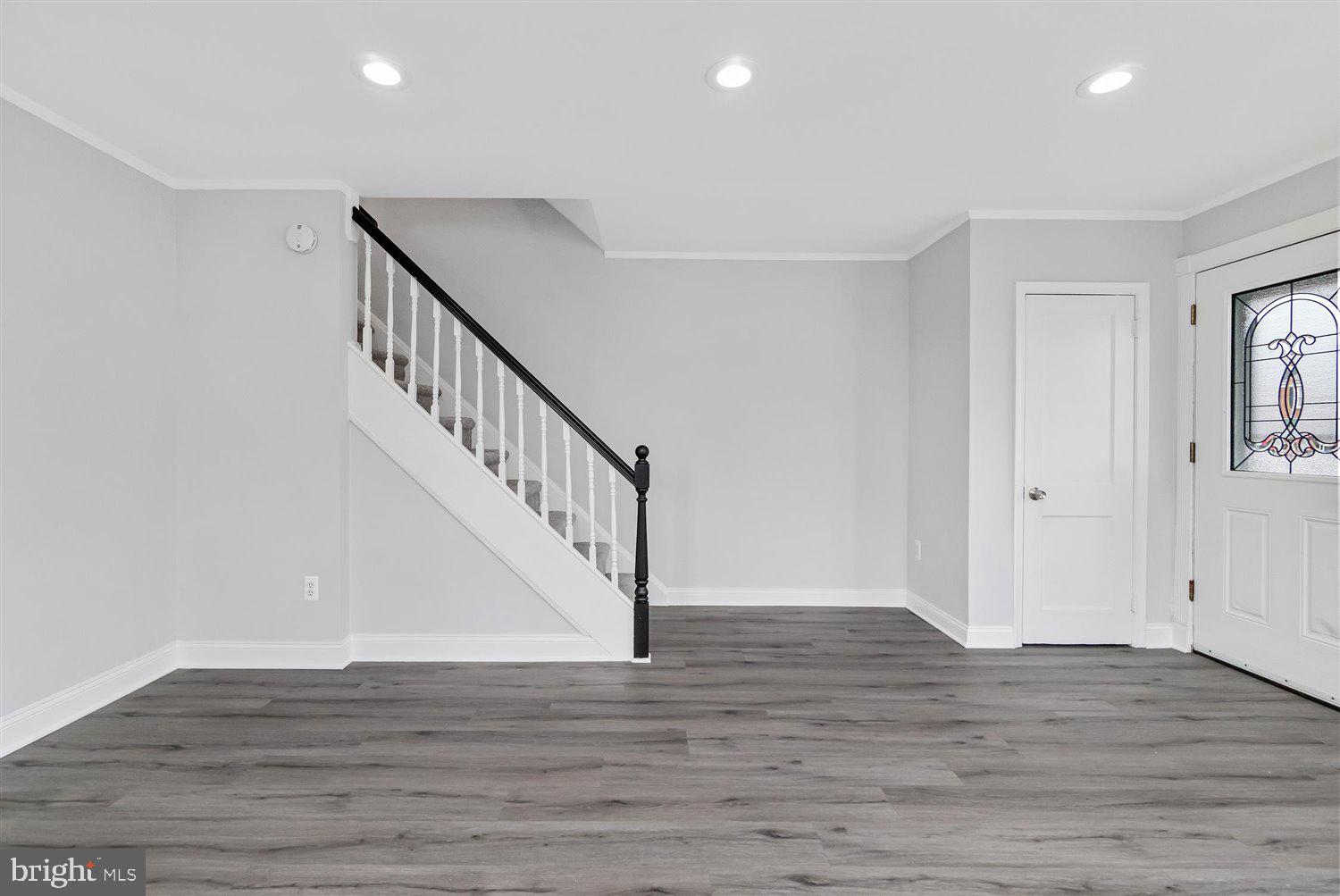 8419 Kavanagh Road Baltimore, MD 21222 - Photo 9 of 31 a view of entryway and hall with wooden floor