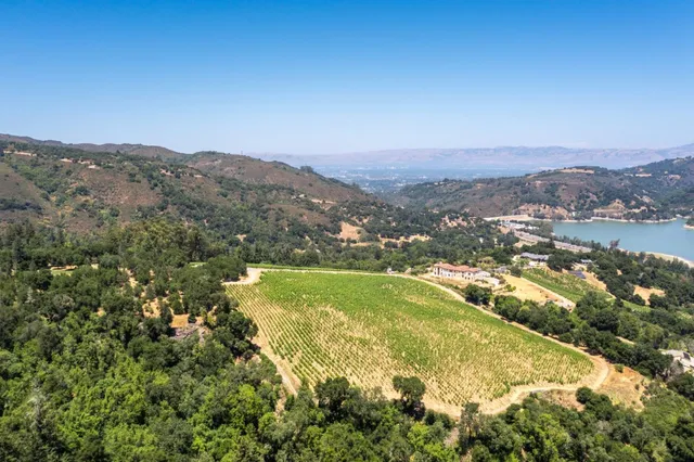 a view of a city with mountains in the background