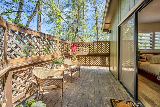 a view of a house with a yard patio and sitting area