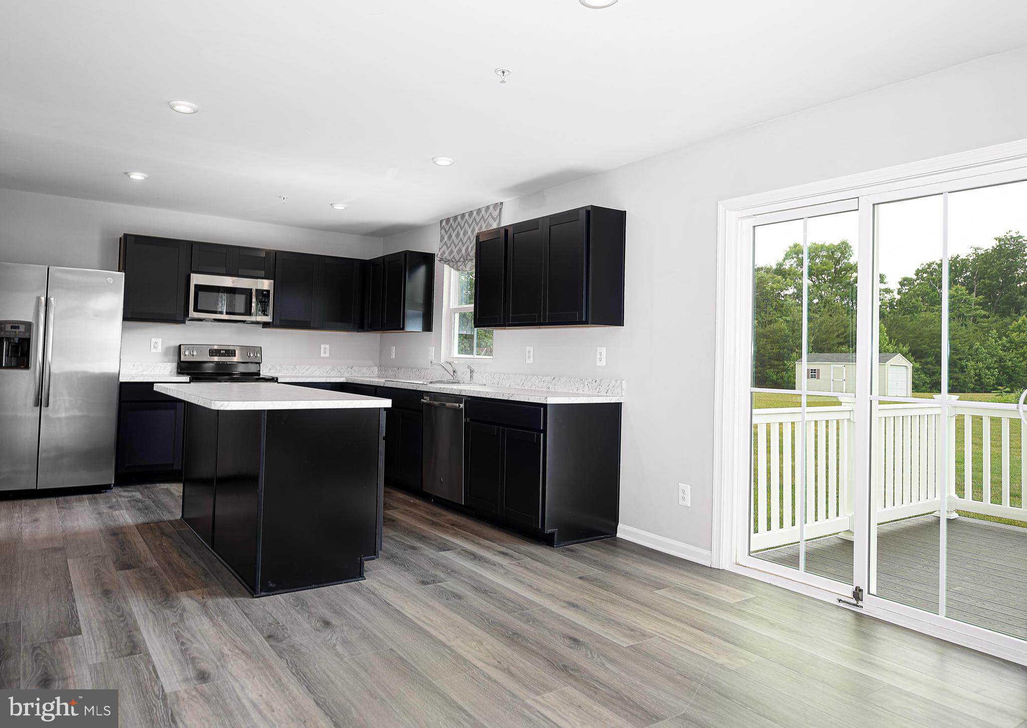 2 Ridgely Forest Drive Elkton, MD 21921 - Photo 11 of 30 Natural sunlight & recessed lights fill the space