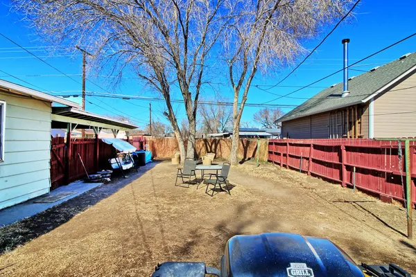 a view of backyard with deck