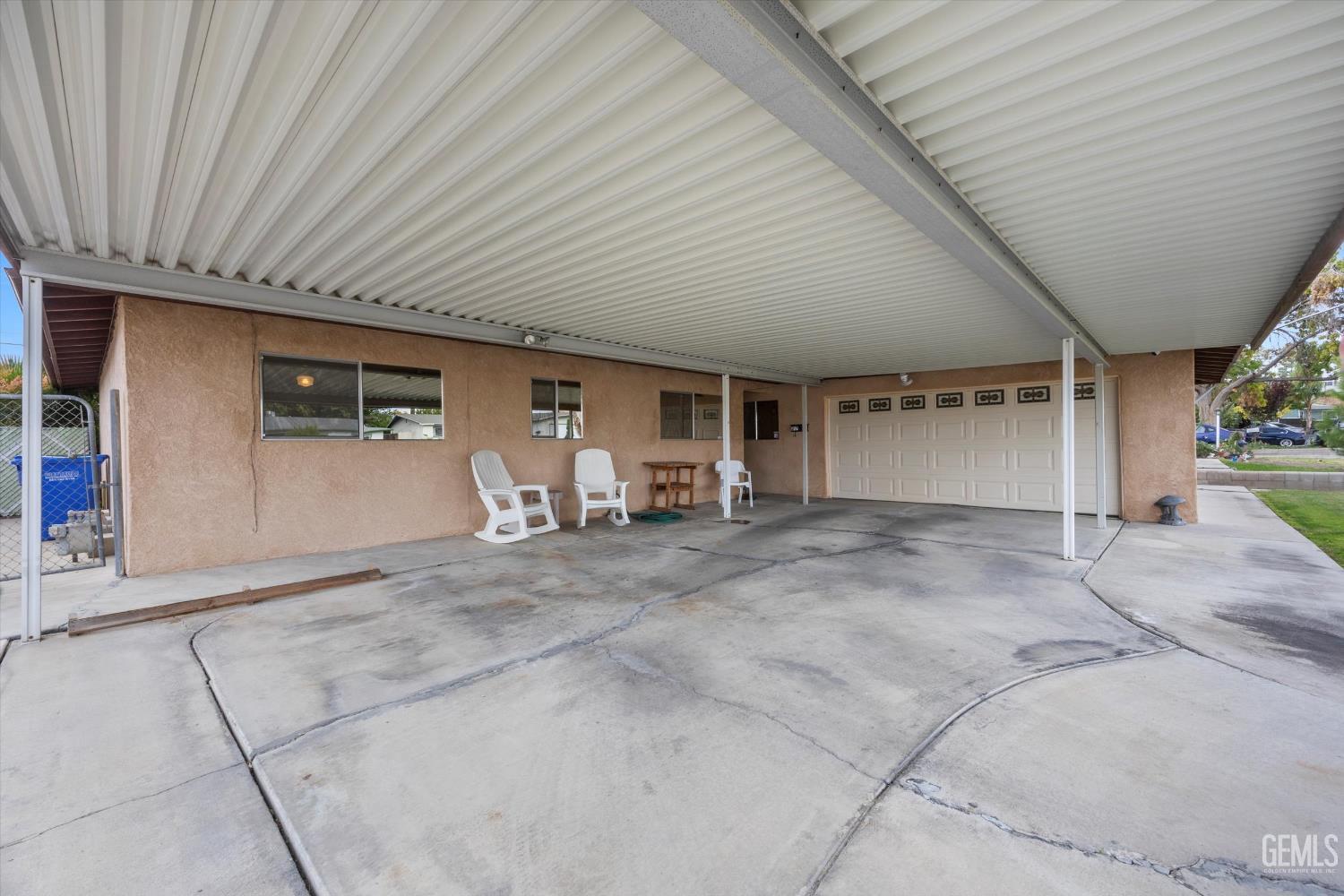 Undisclosed Address Taft, CA 93268 - Photo 13 of 42 a view of a house with a patio