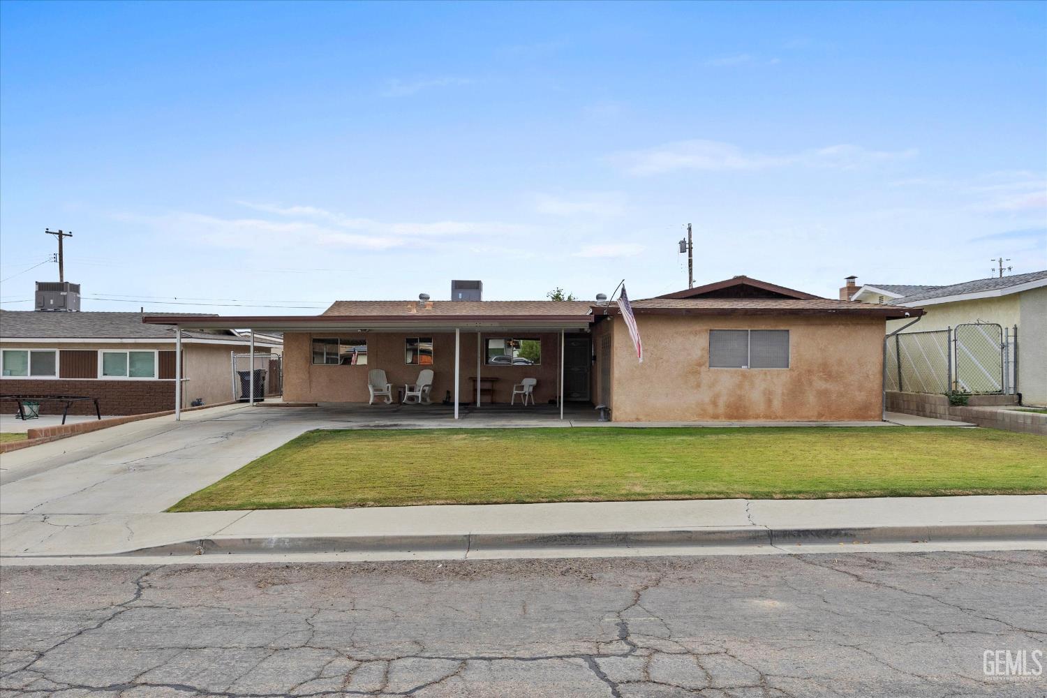 Undisclosed Address Taft, CA 93268 - Photo 13 of 42 a view of a yard in front of a house