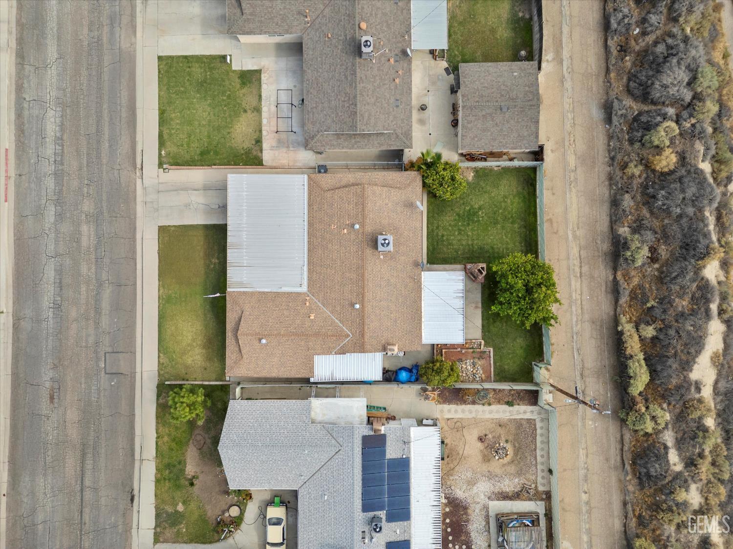 Undisclosed Address Taft, CA 93268 - Photo 8 of 42 an aerial view of a house with outdoor space