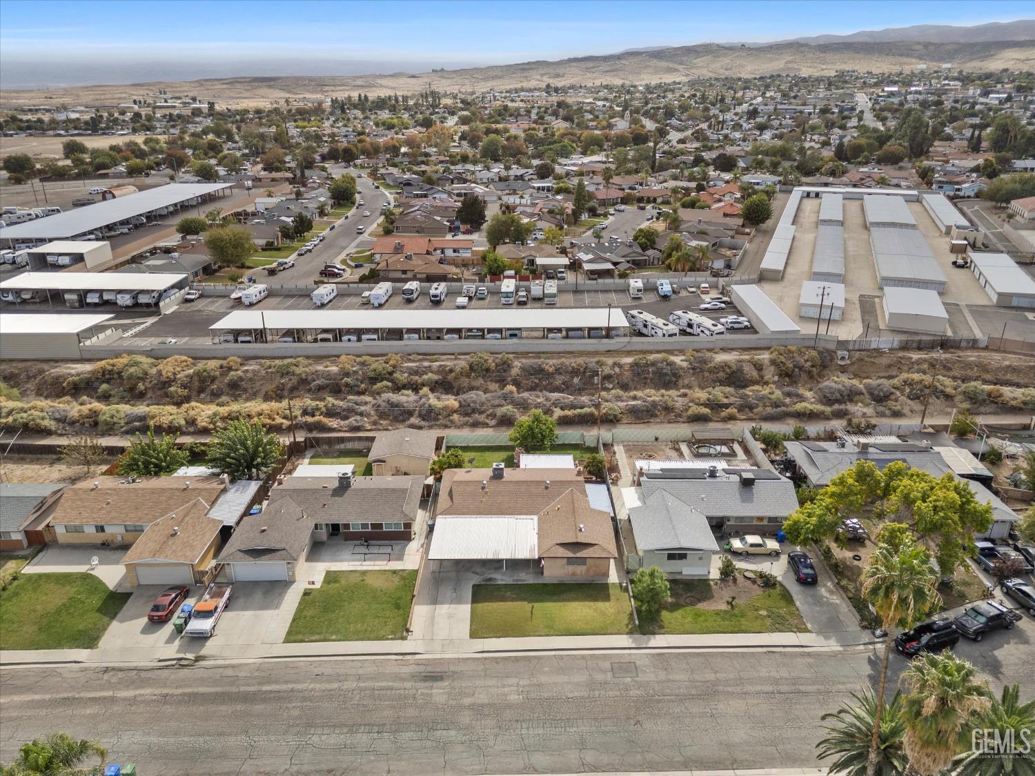 Undisclosed Address Taft, CA 93268 - Photo 10 of 42 an aerial view of residential houses with outdoor space