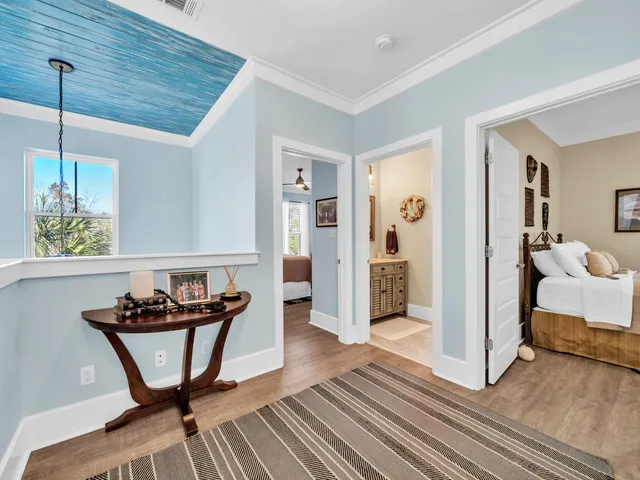 a bathroom with a sink mirror and vanity