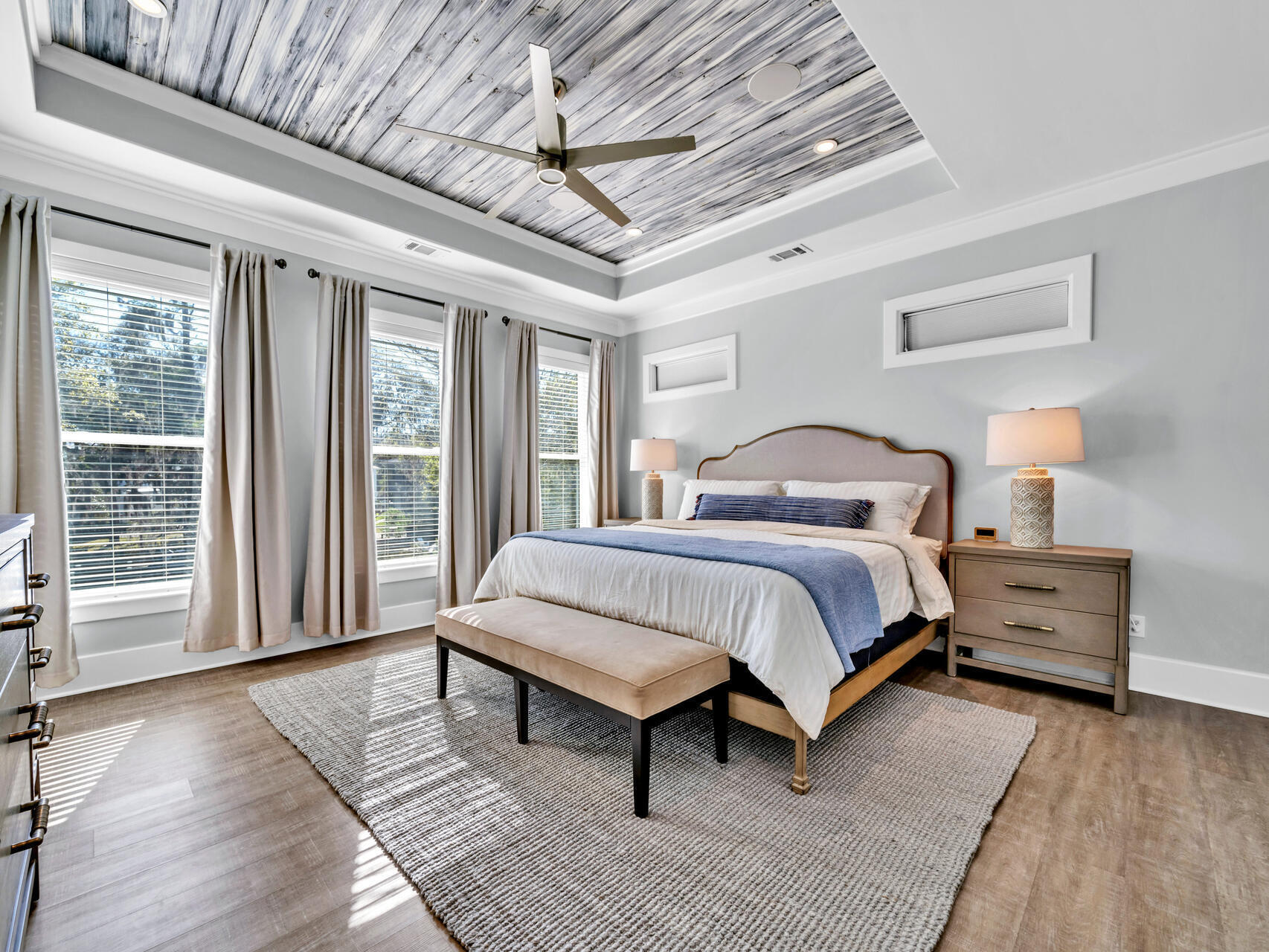 160 Rearden Way Santa Rosa Beach, FL 32459 - Photo 14 of 84 a bedroom with a bed lamp and a large window with wooden floor