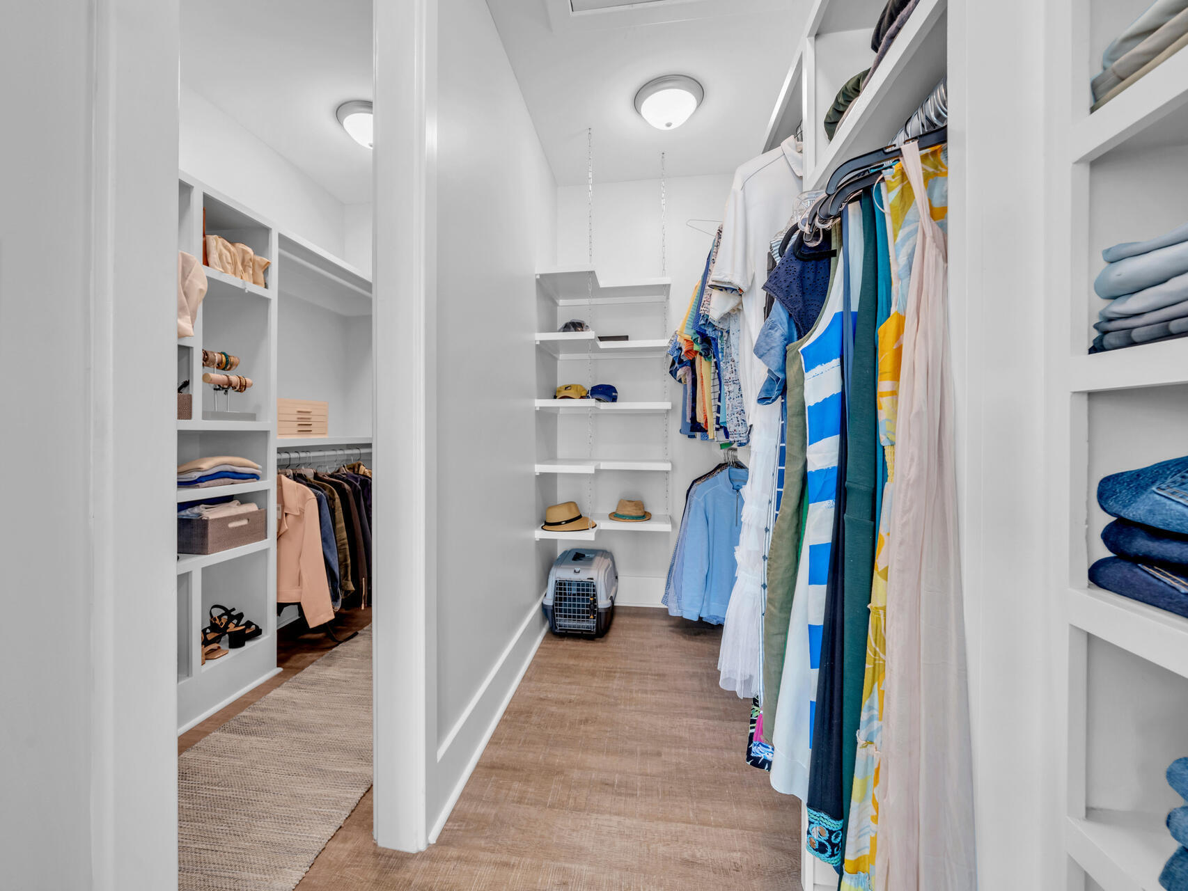 160 Rearden Way Santa Rosa Beach, FL 32459 - Photo 15 of 84 a view of walk in closet with clothes and shoes
