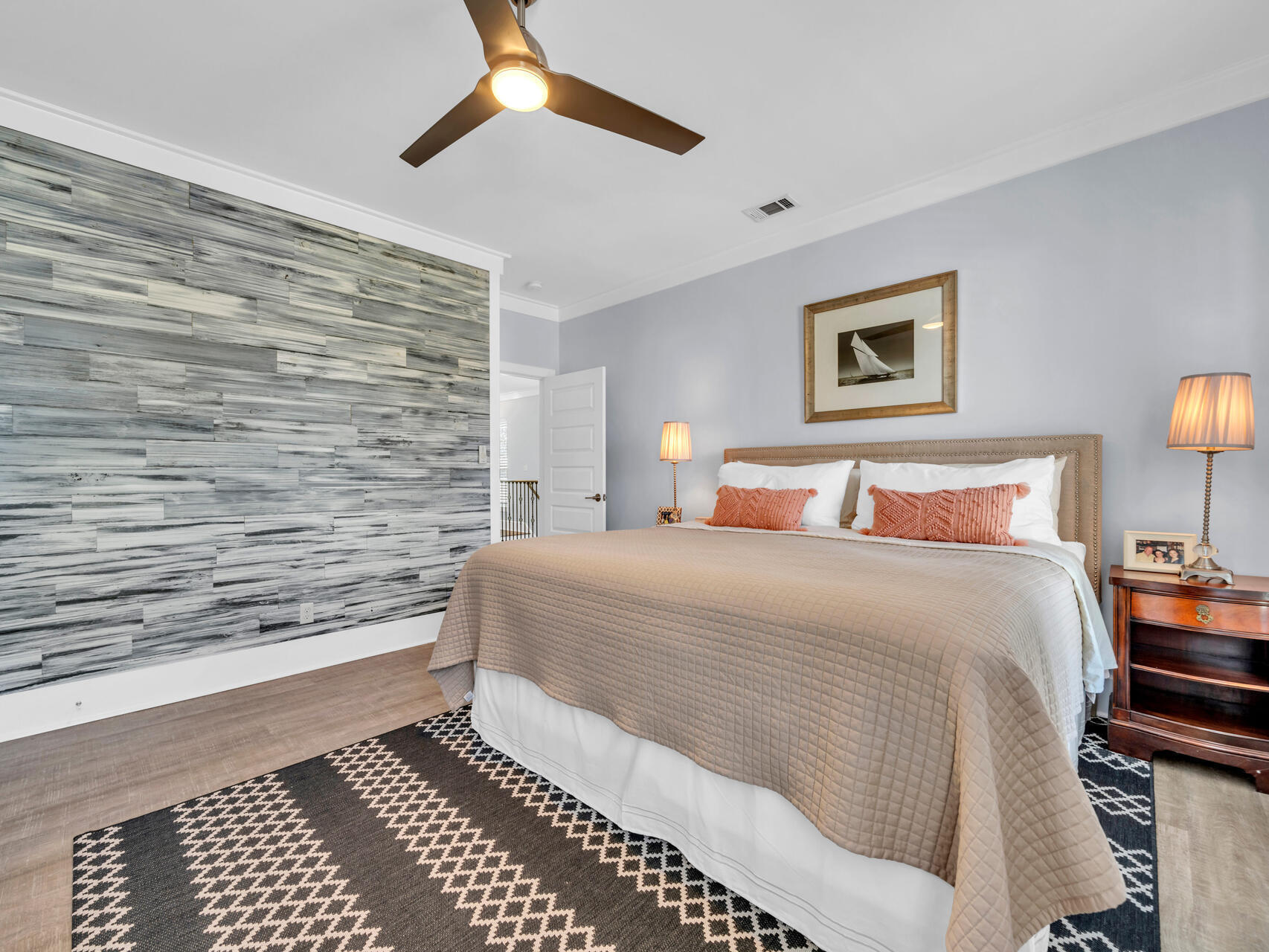 160 Rearden Way Santa Rosa Beach, FL 32459 - Photo 21 of 84 a bedroom with a bed and a lamp on table