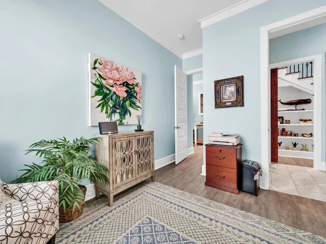 a bed room with a bed and a chandelier