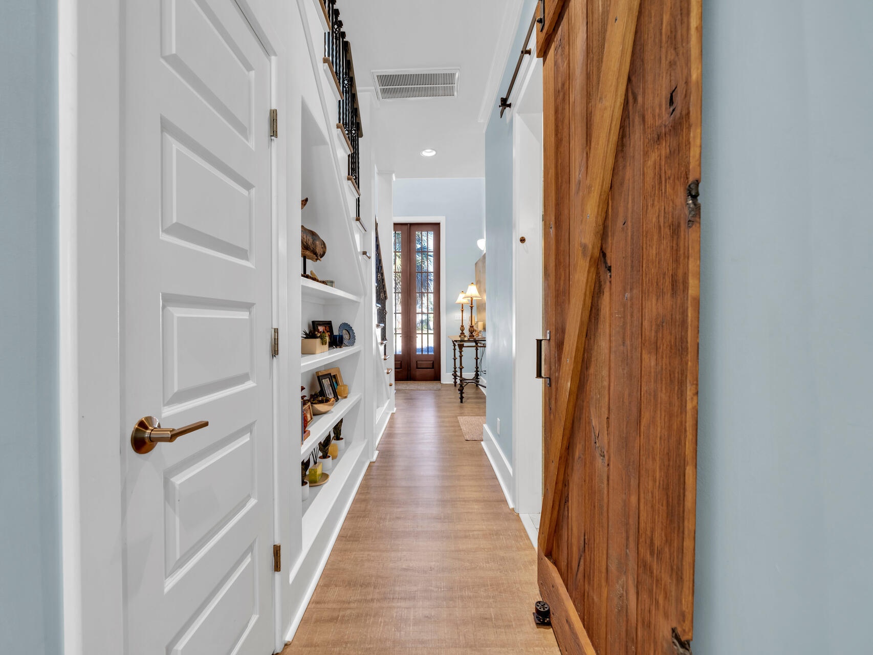 160 Rearden Way Santa Rosa Beach, FL 32459 - Photo 30 of 84 a view of a hallway with wooden floor and staircase