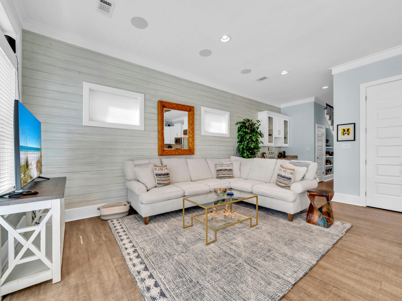 160 Rearden Way Santa Rosa Beach, FL 32459 - Photo 32 of 84 a living room with furniture wooden floor and a flat screen tv