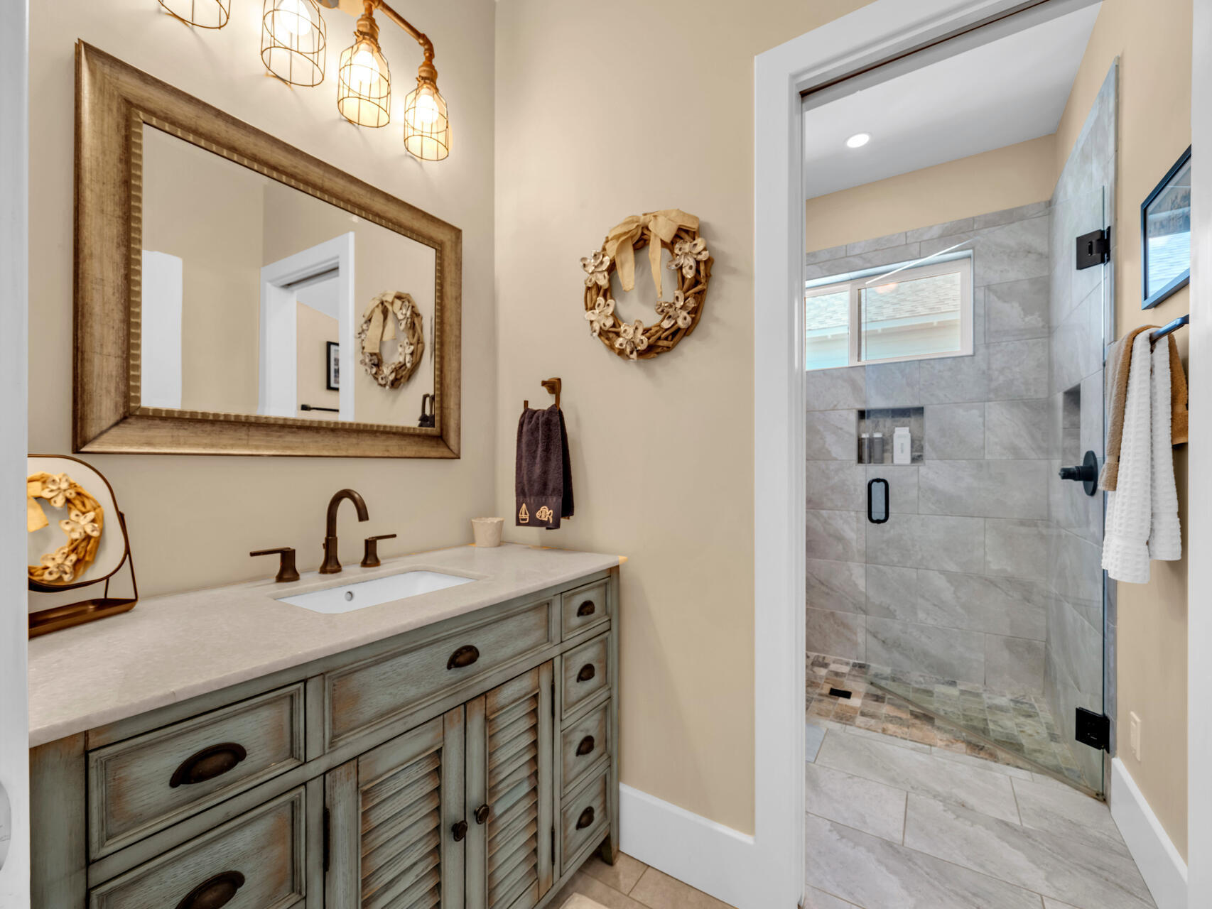 160 Rearden Way Santa Rosa Beach, FL 32459 - Photo 41 of 84 a bathroom with a sink and a mirror