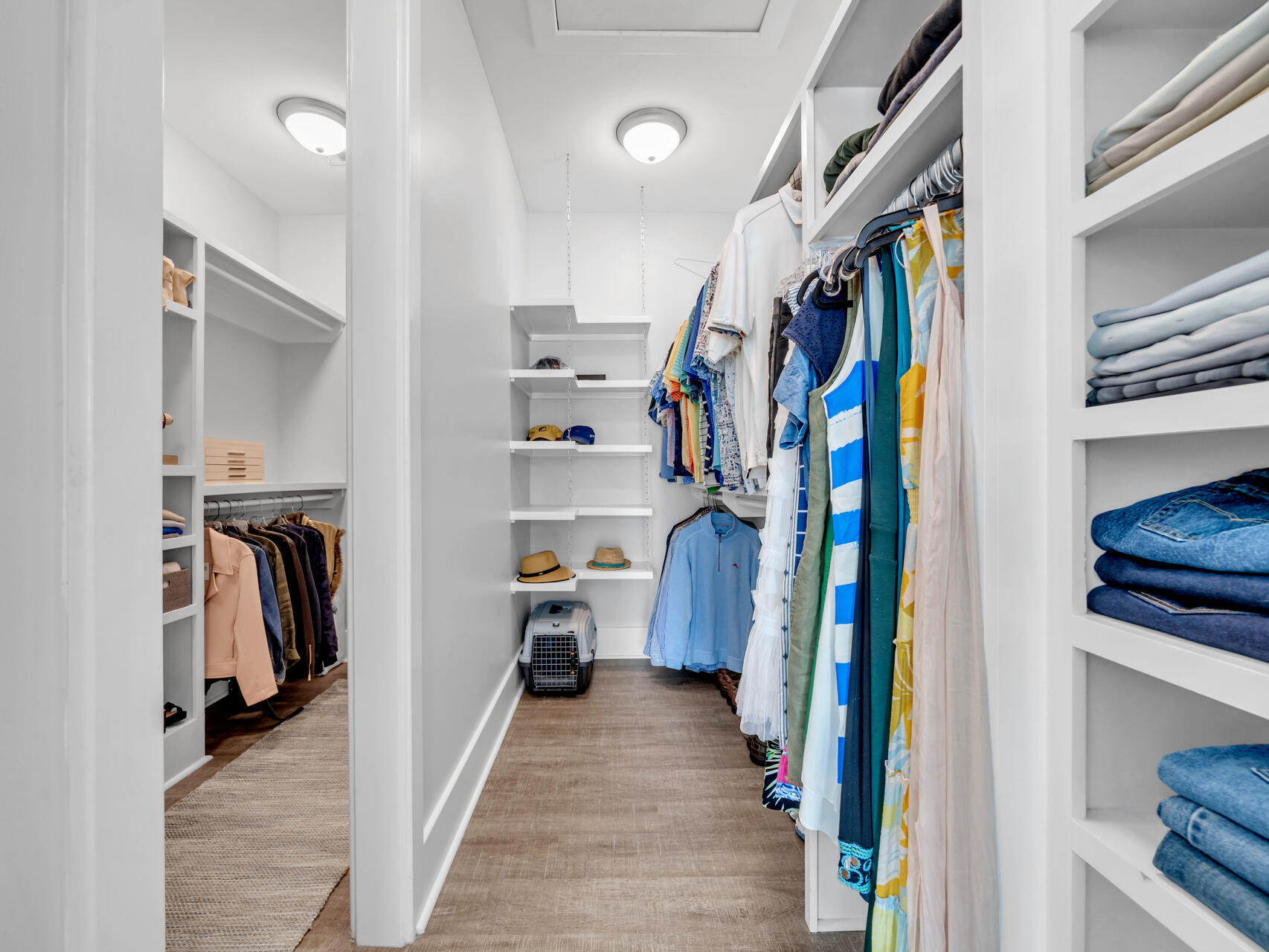 160 Rearden Way Santa Rosa Beach, FL 32459 - Photo 47 of 84 a view of walk in closet with clothes and shoes