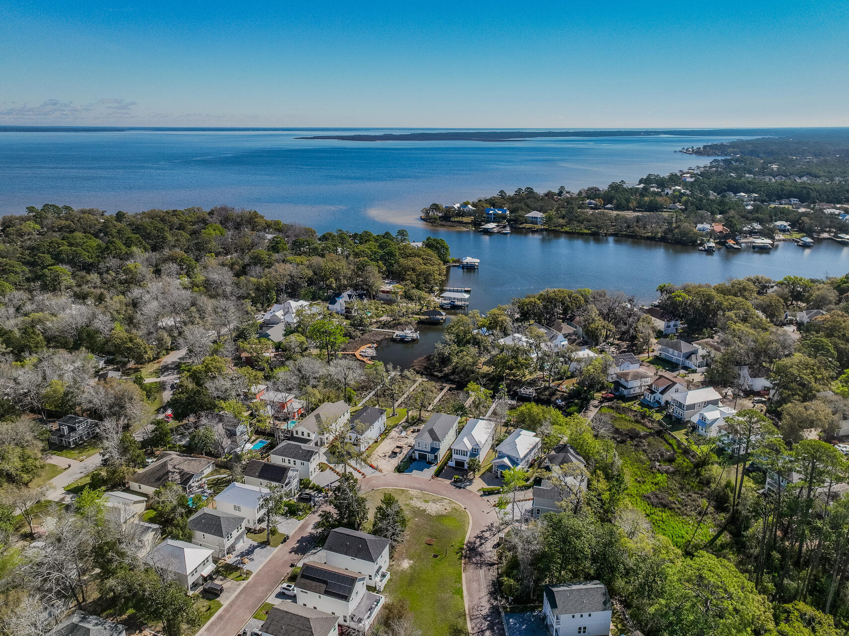 160 Rearden Way Santa Rosa Beach, FL 32459 - Photo 76 of 84 an aerial view of ocean and residential houses with outdoor space