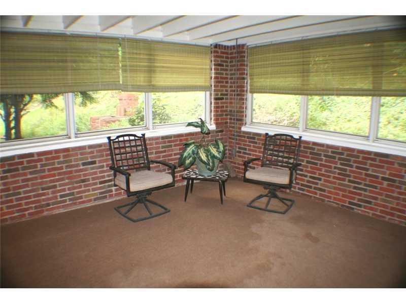 210 Siebert Road Pittsburgh, PA 15237 - Photo 21 of 25 Sunroom. The 3 Seasons Room off the Dining Room is great for relaxing and Overlooking the Lush Yard.