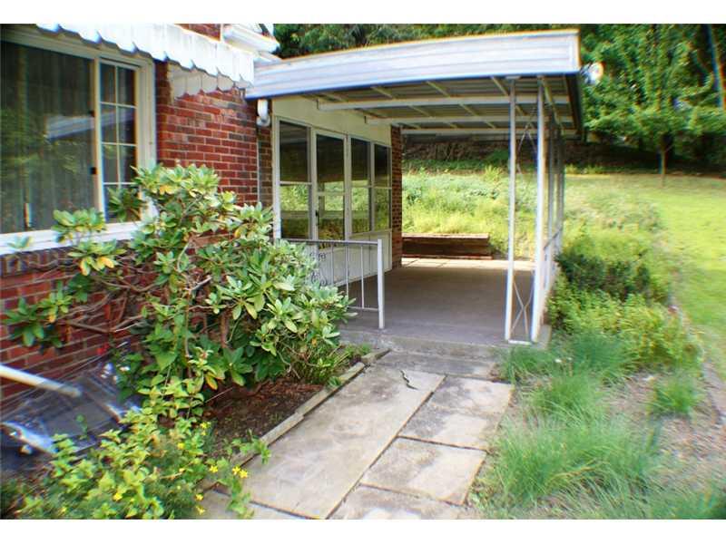 210 Siebert Road Pittsburgh, PA 15237 - Photo 22 of 25 Patio/Deck. Shown is the Side Porch off the Sunroom