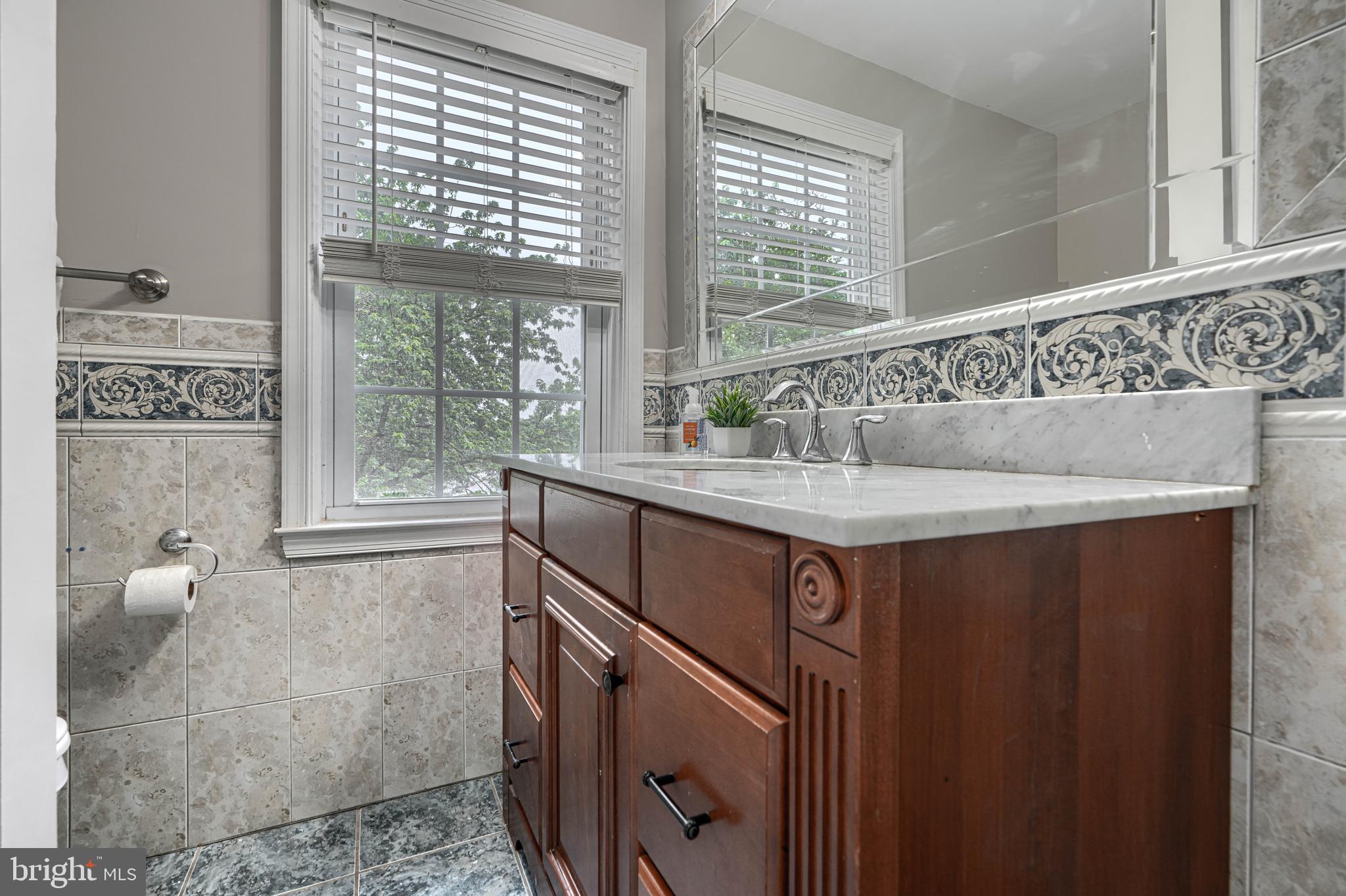 8132 Pleasant Plains Road Towson, MD 21286 - Photo 31 of 55 a kitchen with a sink and a window