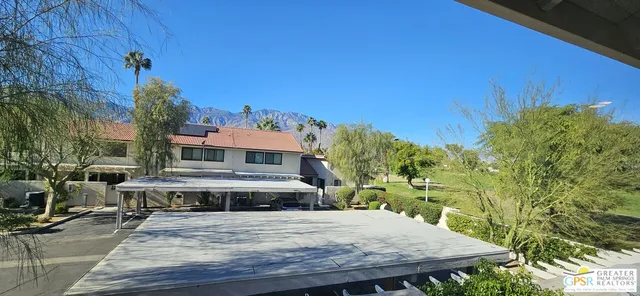 a view of a terrace with a garden