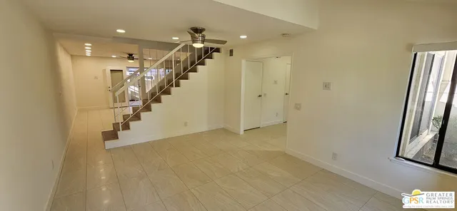 a view of hallway with stairs
