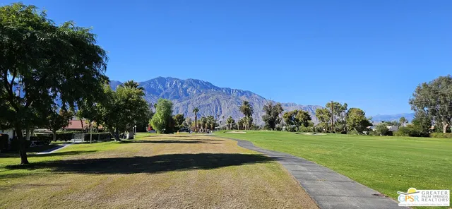 a view of a golf course with a play ground