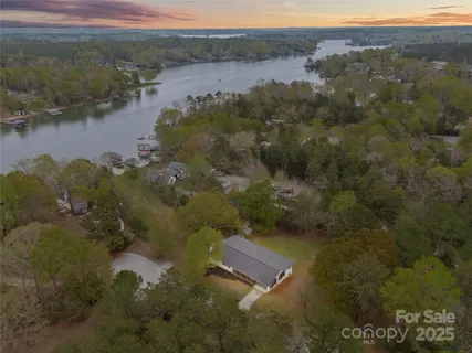 an aerial view of residential house with outdoor space