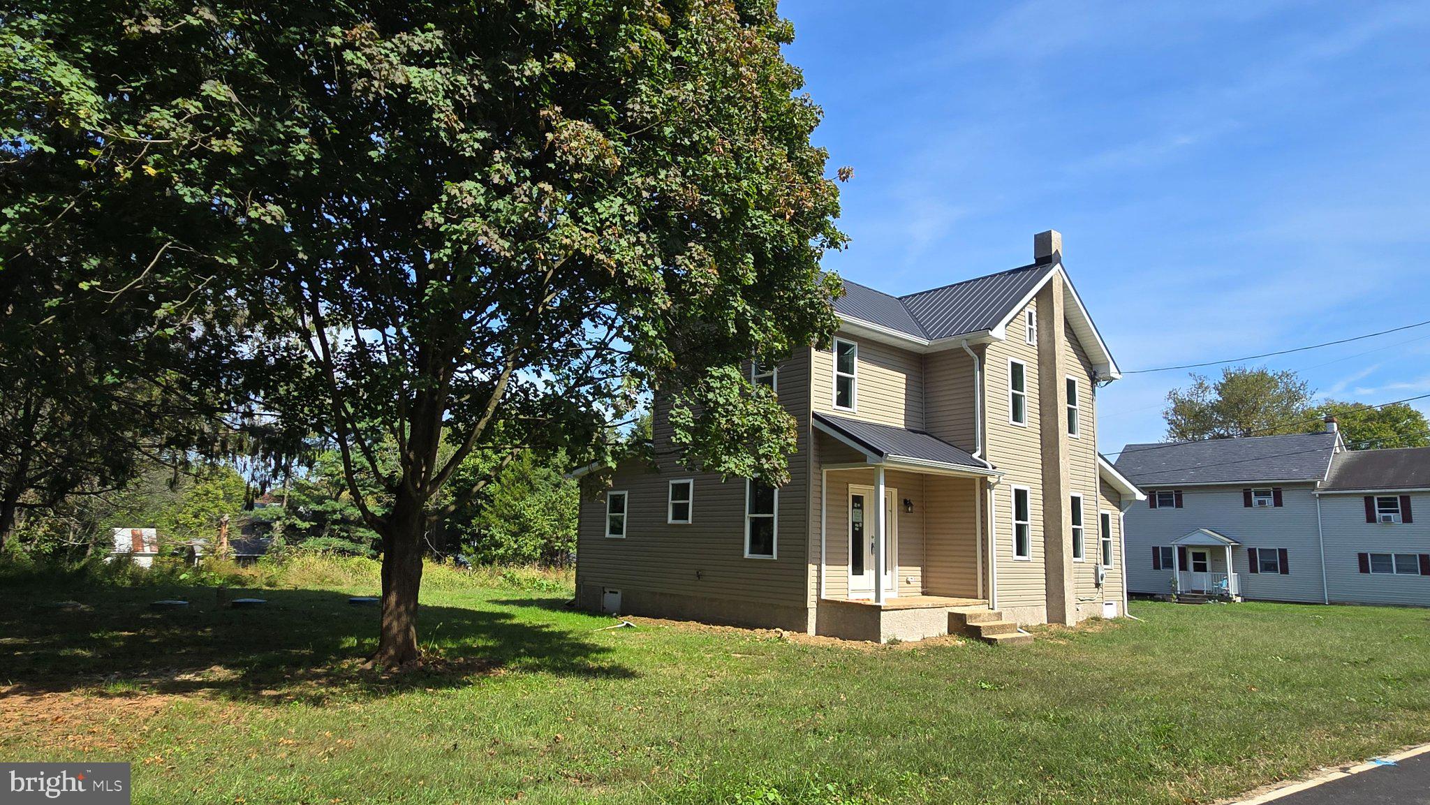 743 Bell Manor Road Conowingo, MD 21918 - Photo 6 of 58 Rear entrance w/plenty of parking & shade trees
