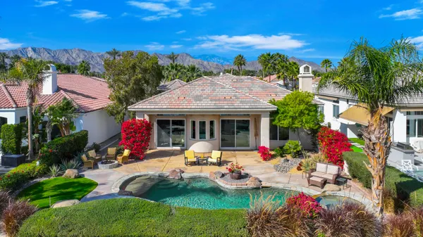 a view of a house with a swimming pool