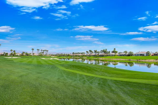a view of a golf course with a garden
