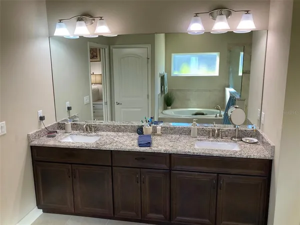 a view of workspace with furniture and windows