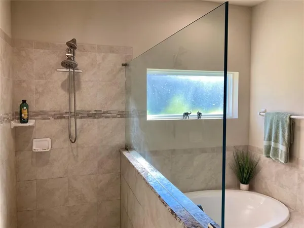 a view of a house with yard and furniture