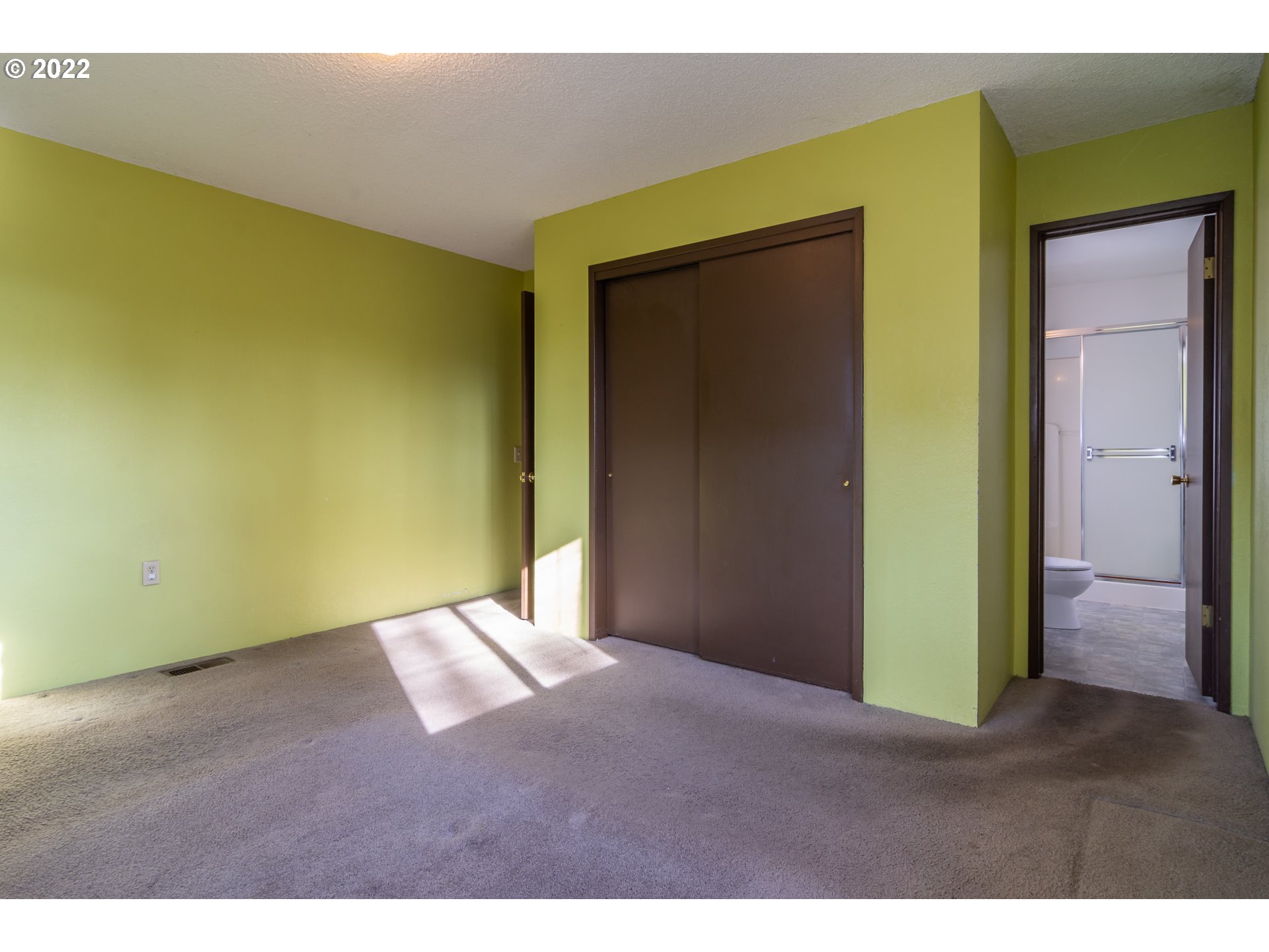 2068 North Myrtle Road Myrtle Creek, OR 97457 - Photo 21 of 32 a view of an empty room with closet and wooden floor