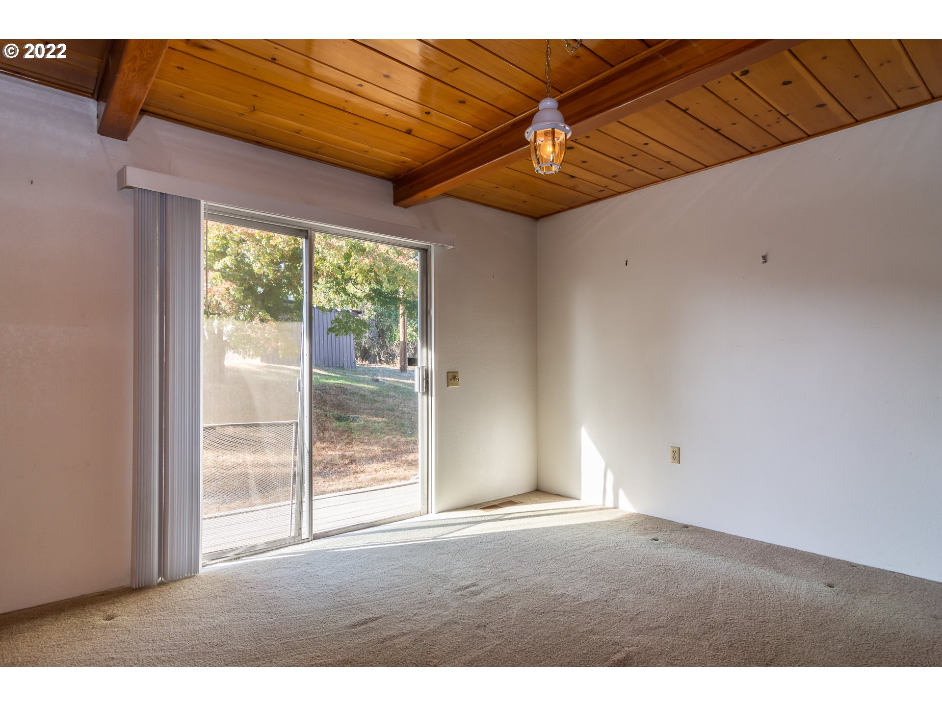 2068 North Myrtle Road Myrtle Creek, OR 97457 - Photo 7 of 32 a view of an empty room with a window
