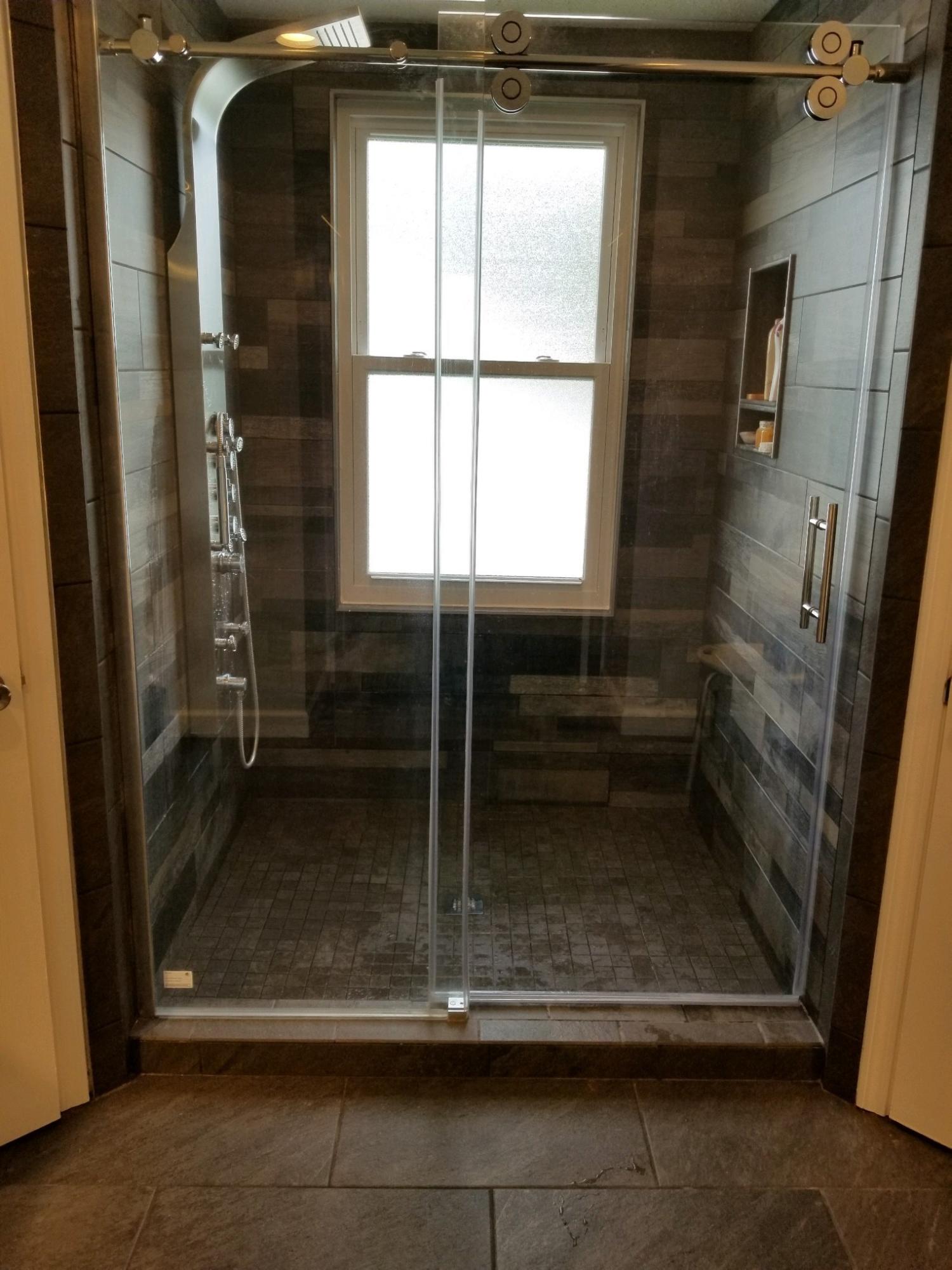 147 Nicole Lane Crestview, FL 32539 - Photo 12 of 13 a bathroom with a glass door shower and a sink