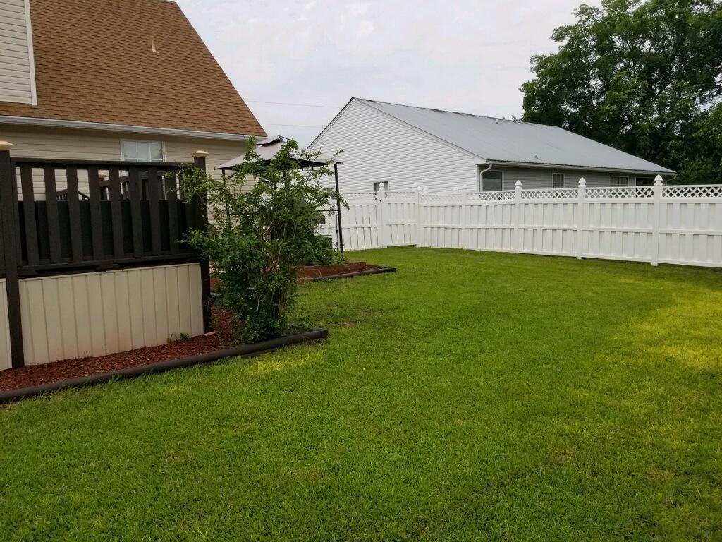 147 Nicole Lane Crestview, FL 32539 - Photo 6 of 13 a view of a house with a garden