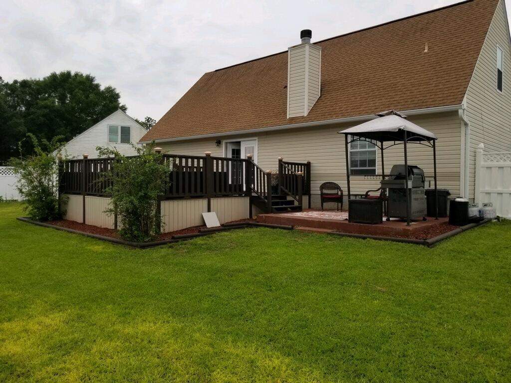 147 Nicole Lane Crestview, FL 32539 - Photo 7 of 13 a view of a house with backyard and porch