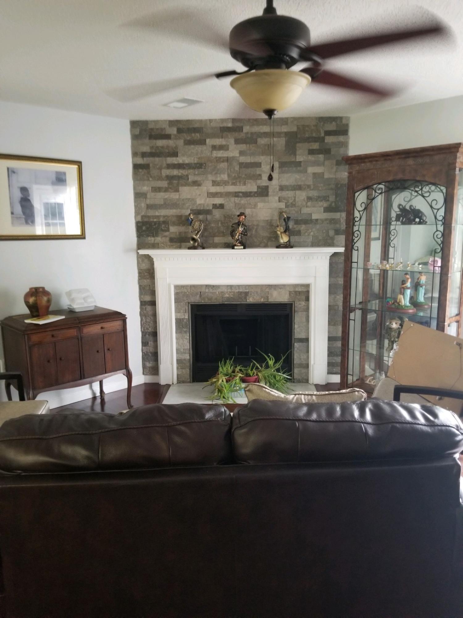 147 Nicole Lane Crestview, FL 32539 - Photo 9 of 13 a living room with furniture and a fireplace
