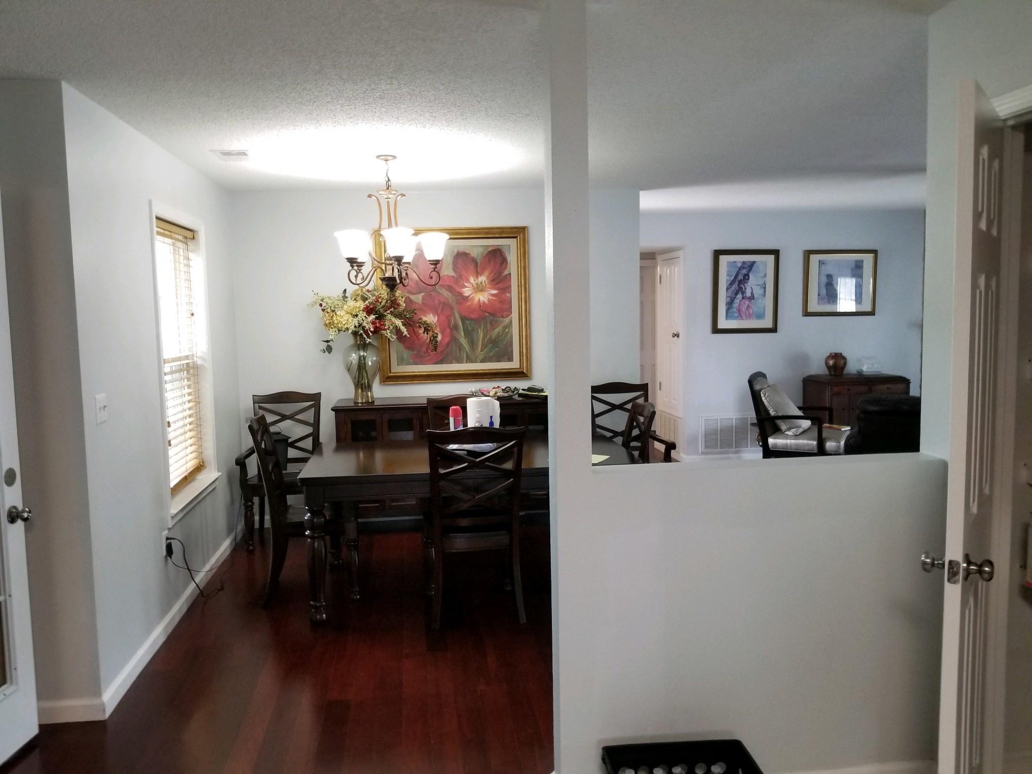 147 Nicole Lane Crestview, FL 32539 - Photo 10 of 13 a view of a dining room with furniture and chandelier