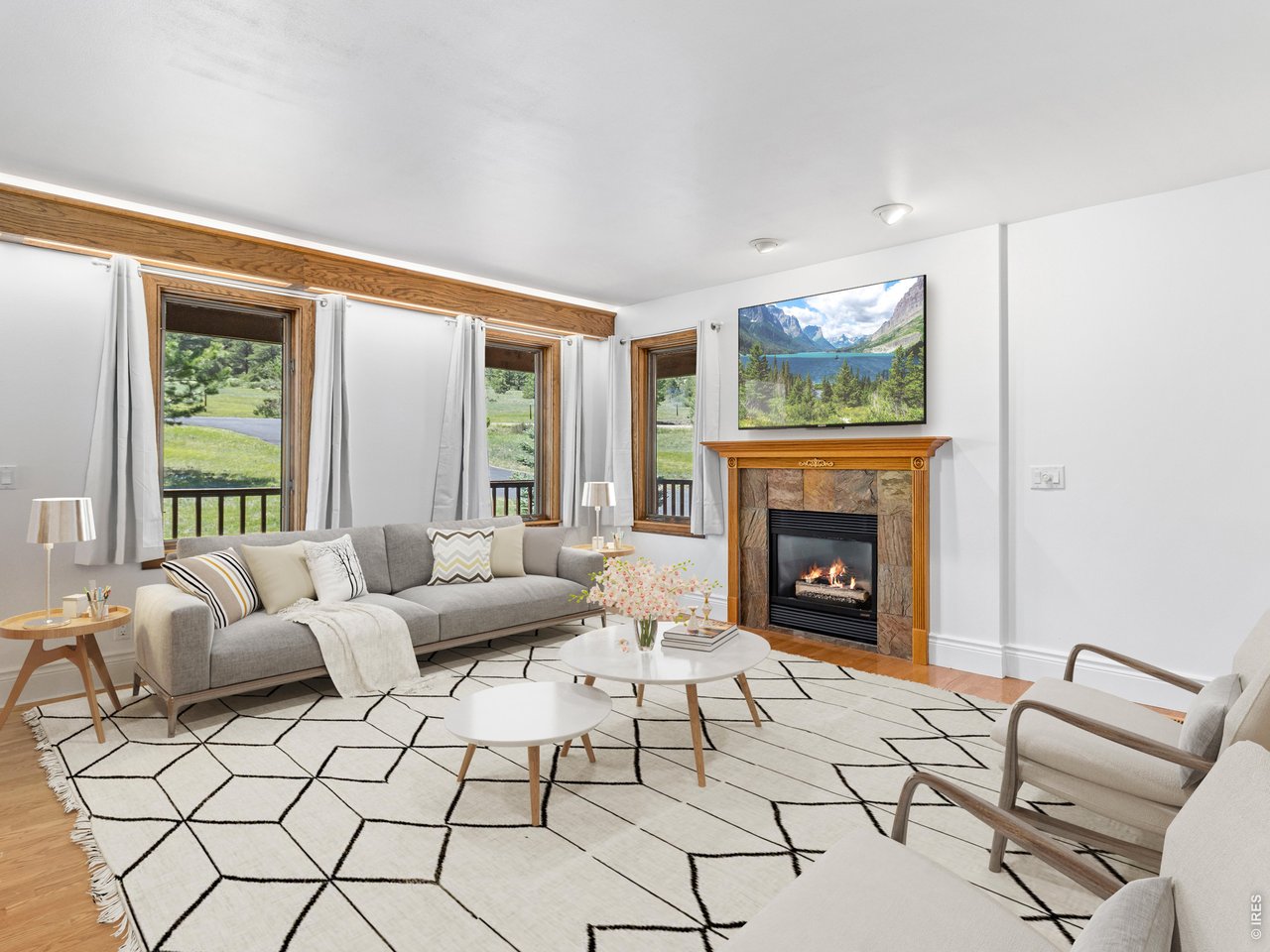 2180 Devils Gulch Road Estes Park, CO 80517 - Photo 13 of 40 Living room with virtual staging