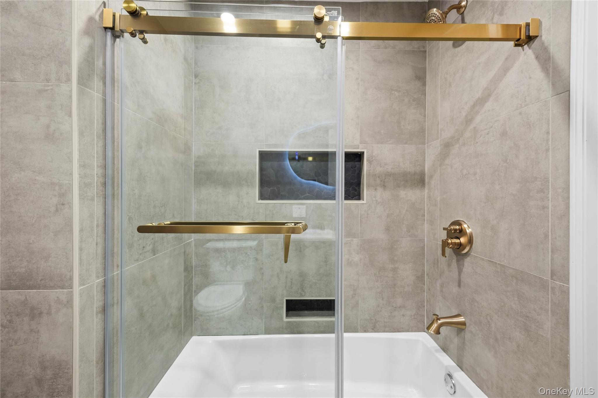 11 Ranch Place Merrick, NY 11566 - Photo 23 of 40 a bathroom with a shower and a shower