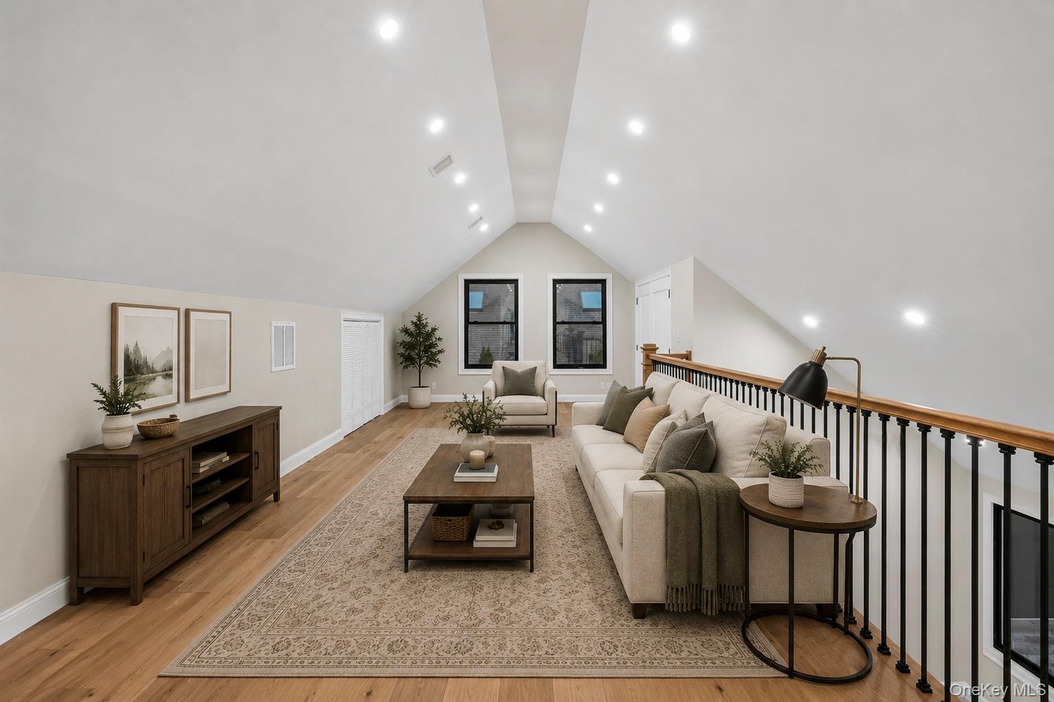 11 Ranch Place Merrick, NY 11566 - Photo 35 of 40 a living room with furniture a wooden floor and a flat screen tv