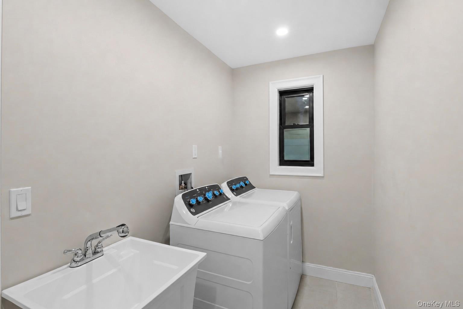 11 Ranch Place Merrick, NY 11566 - Photo 38 of 40 a bathroom with a sink toilet and mirror