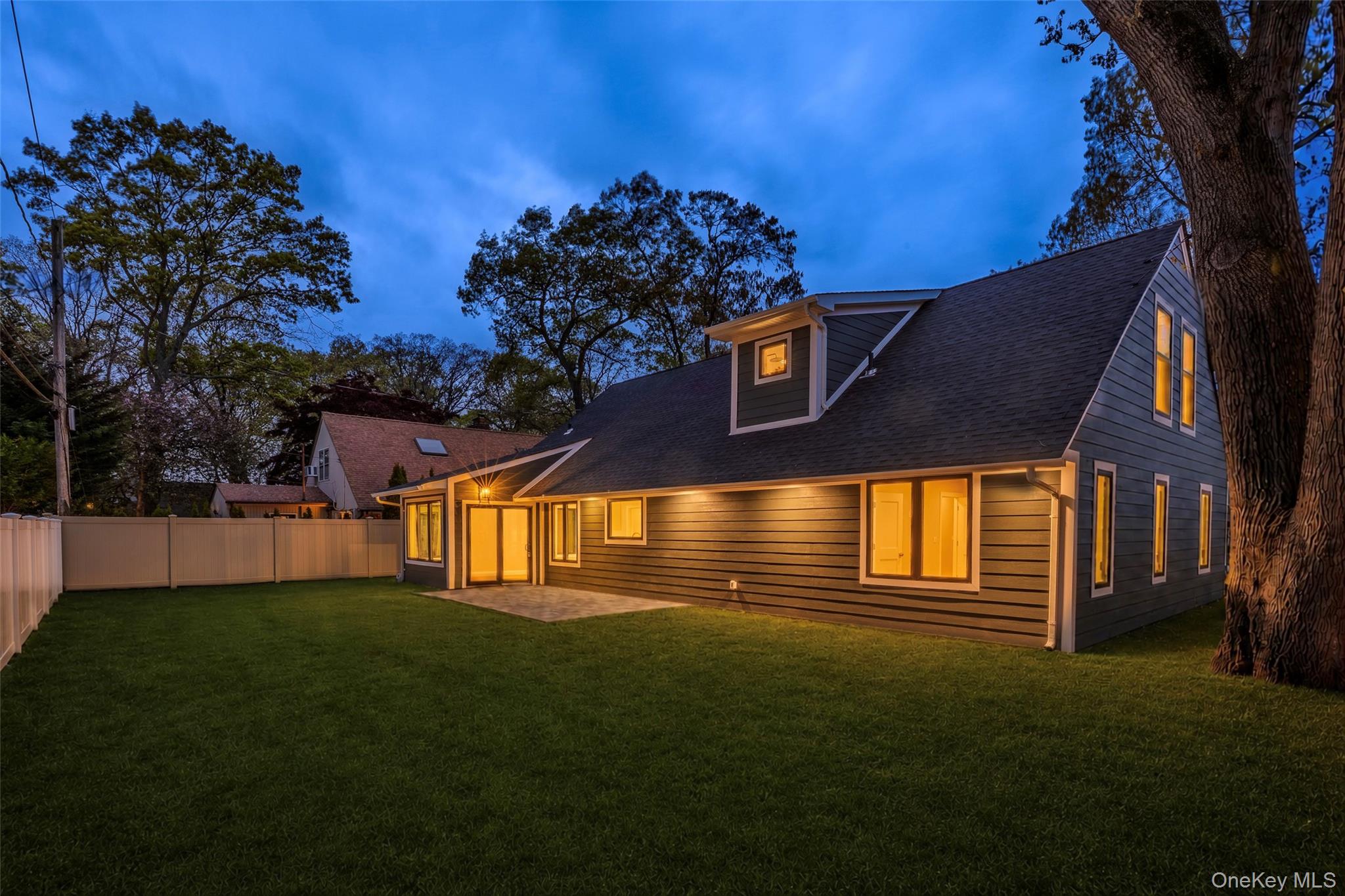 11 Ranch Place Merrick, NY 11566 - Photo 40 of 40 a front view of a house with a yard