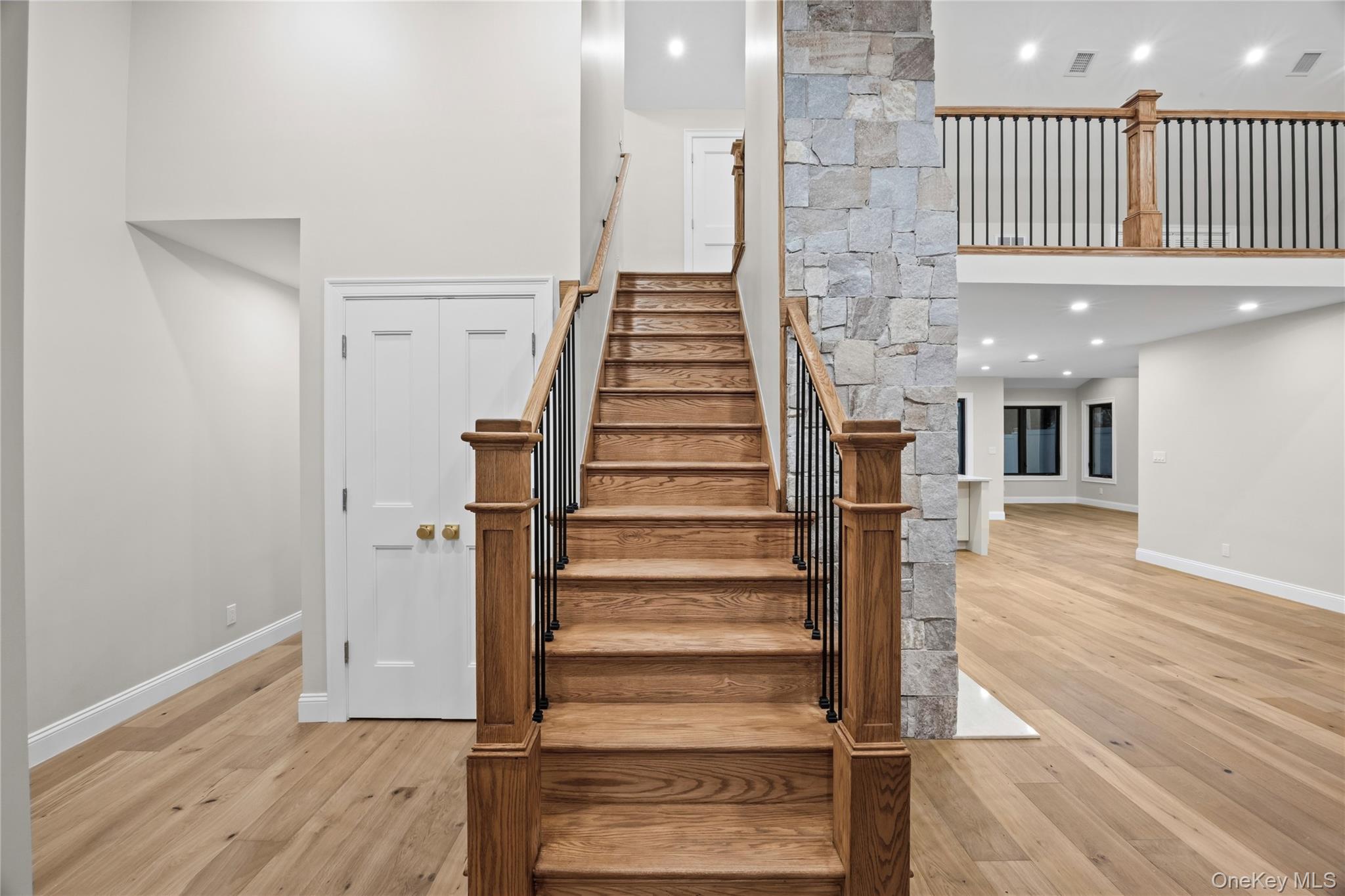 11 Ranch Place Merrick, NY 11566 - Photo 5 of 40 a view of entryway and hall with wooden floor