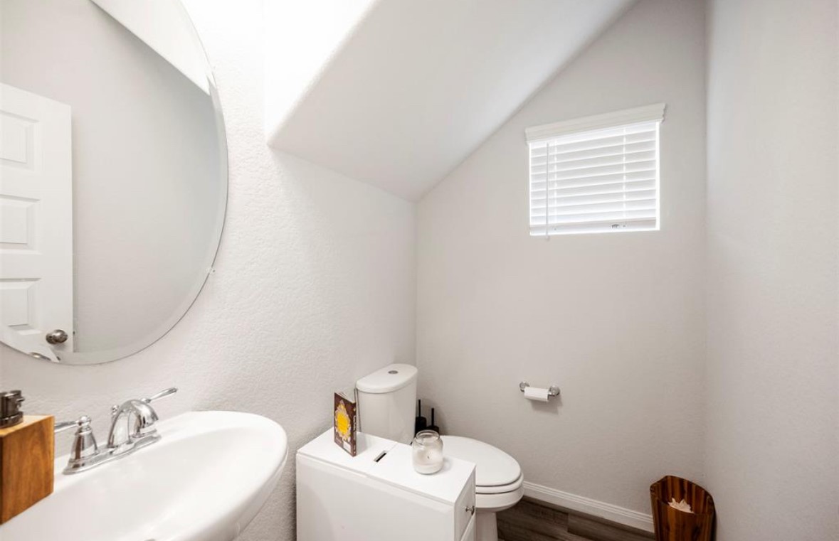 5527 Cuerta Street Houston, TX 77023 - Photo 8 of 17 Half bathroom located downstairs