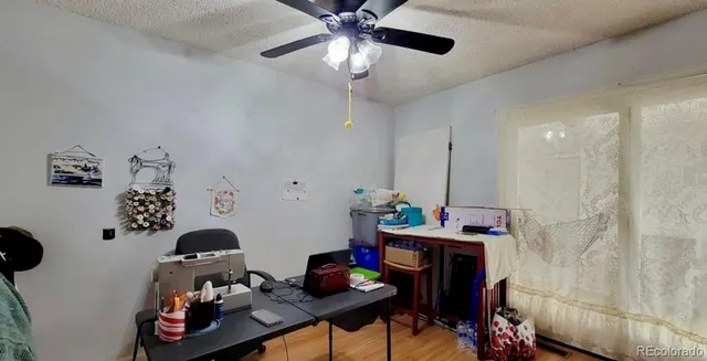 a view of a workspace with furniture