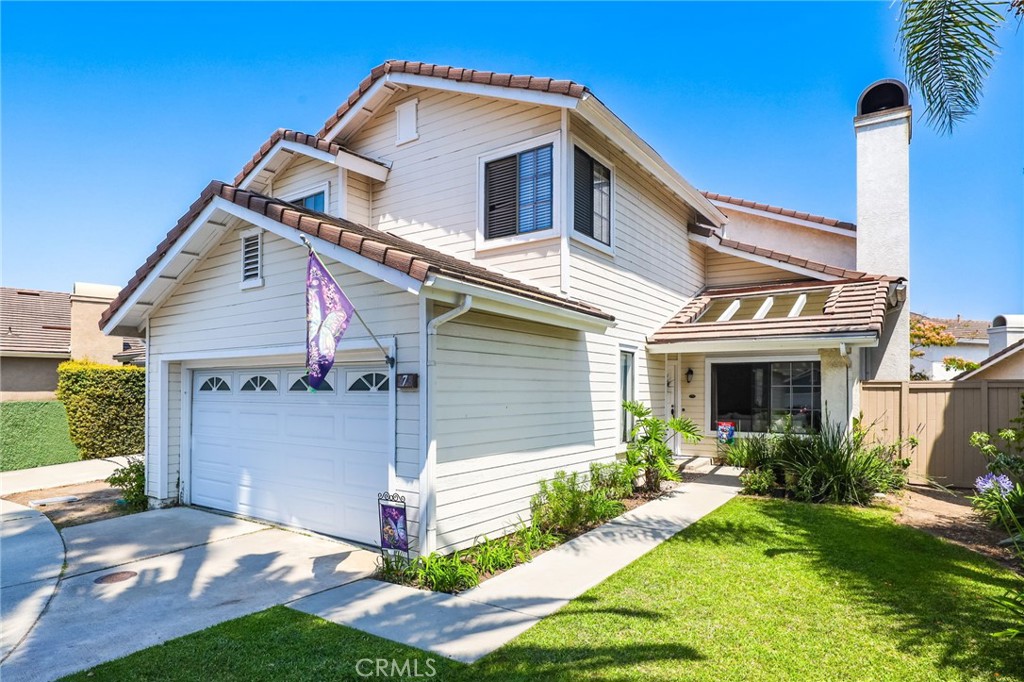 The front of the house shows the window from the living room.