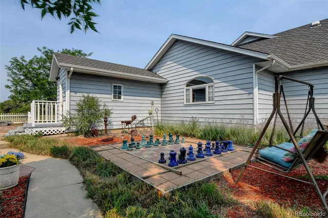 a view of a tables and chairs in the patio