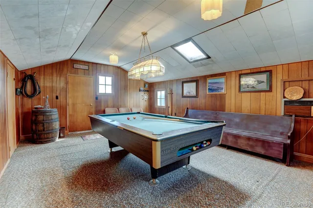 a view of a table and chairs in the patio