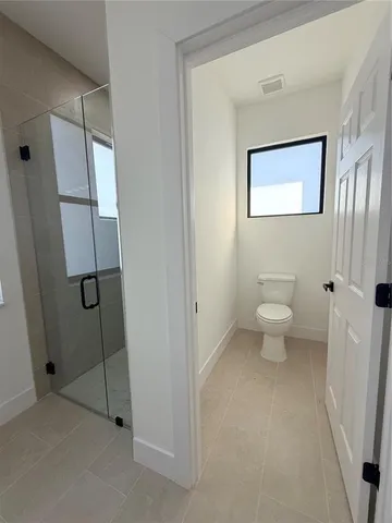 a bathroom with a toilet
